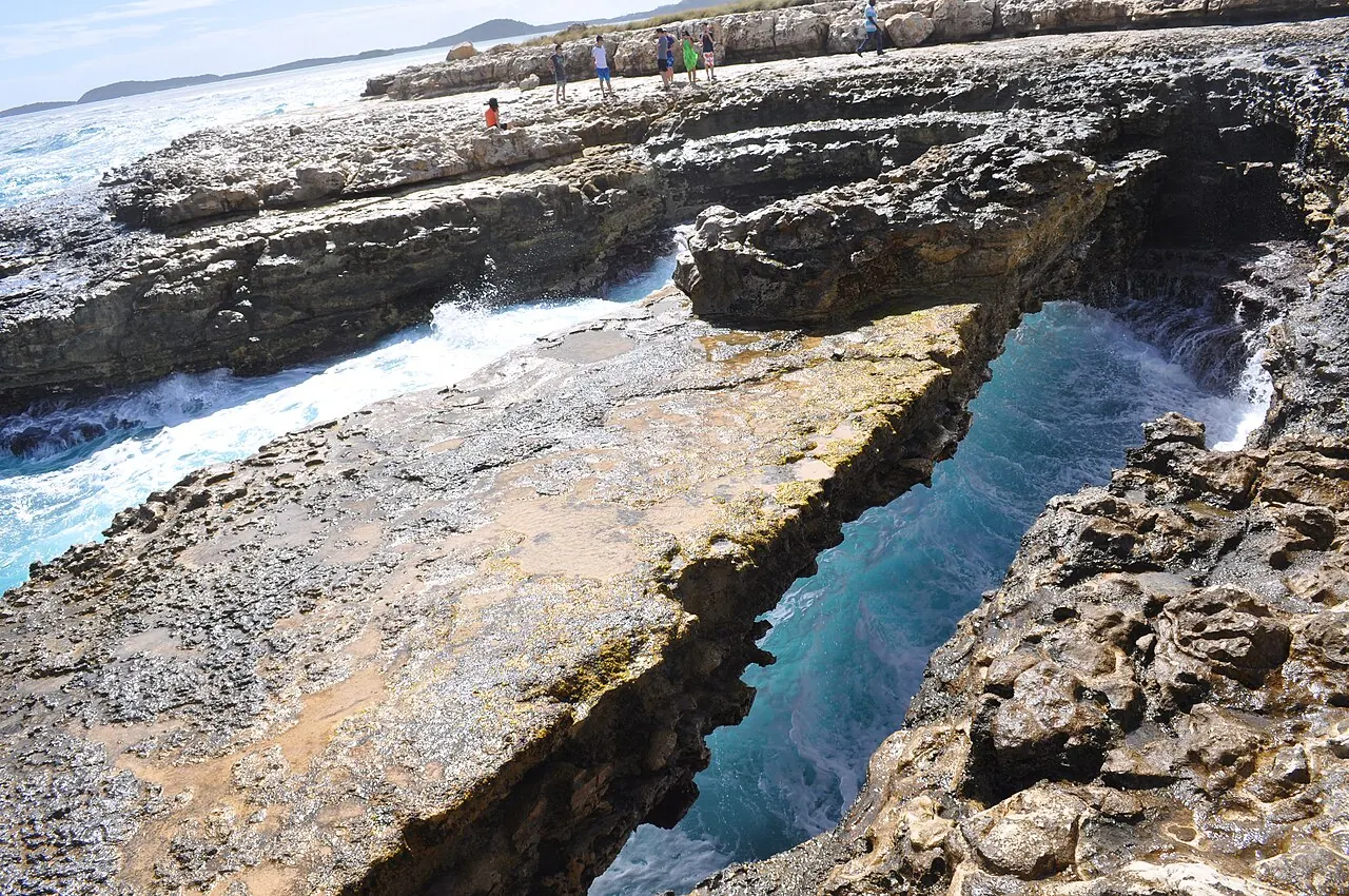 Waves washing through Devil's Bridge, Antigua